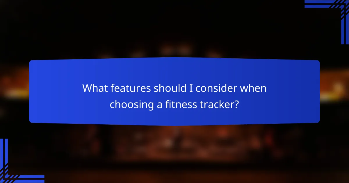 What features should I consider when choosing a fitness tracker?